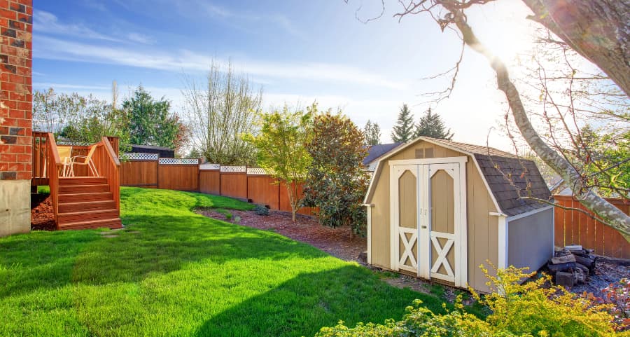 Fenced backyard with storage shed in Raleigh